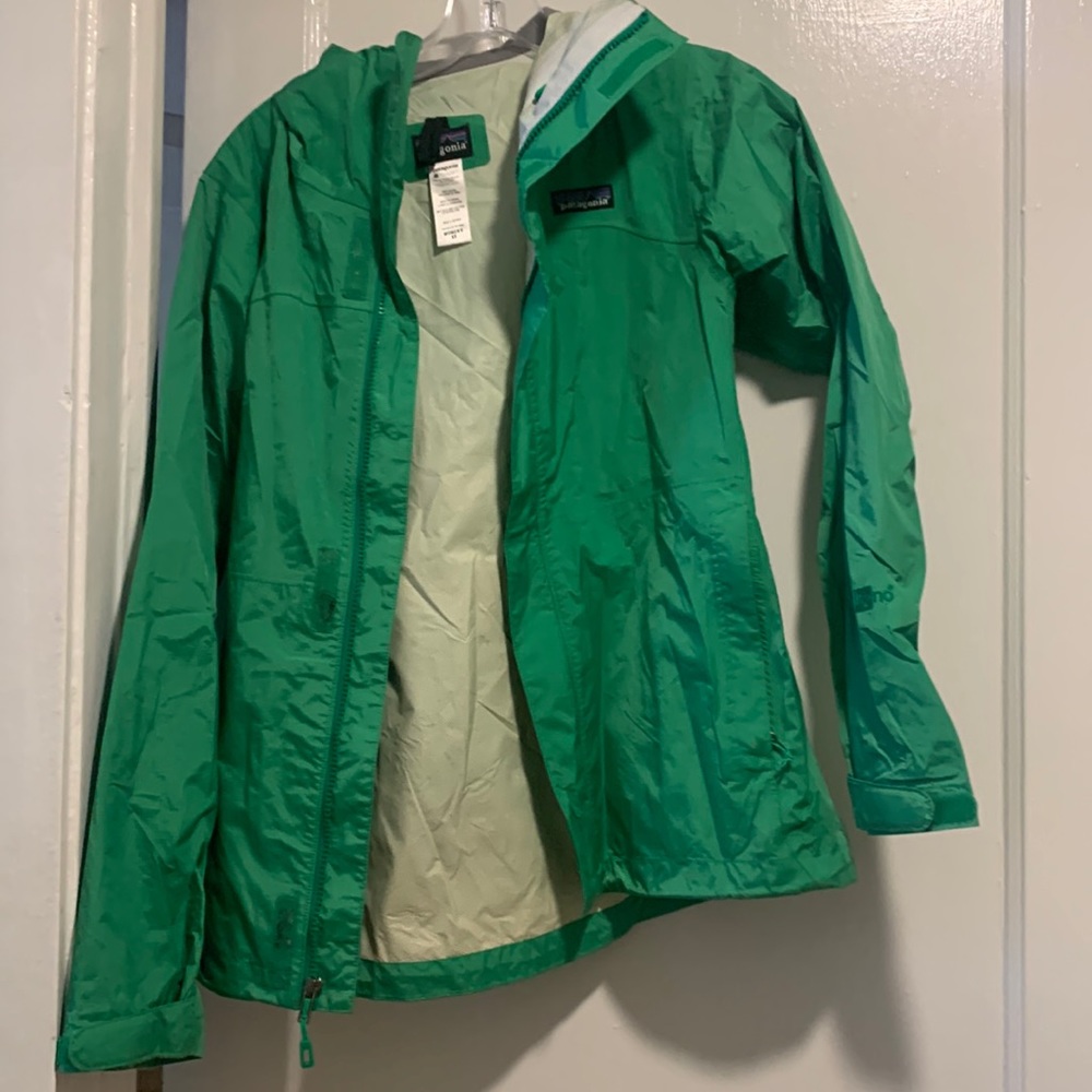 Green Patagonia raincoat